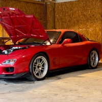 Red 1993 Mazda RX-7 on Silver/Chrome Enkei RPF1