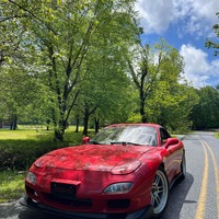 Red 1993 Mazda RX-7 on Silver/Chrome Enkei RPF1